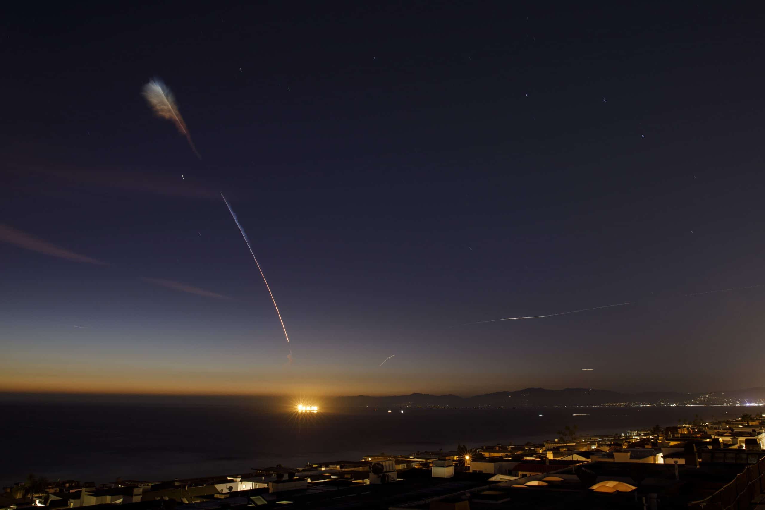 HOLD FOR FARAH CONSIDERATION - A Space Exploration Technologies Corp. (SpaceX) Falcon 9 rocket lights up the evening sky over Manhattan Beach, California as it carries an Argentinian Earth-observing satellite into space after blasting off from Vandenberg Air Force Base on Sunday, October 7, 2018 in Manhattan Beach, California.  2018 Patrick T. Fallon