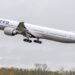 A United 777-300ER takes off
