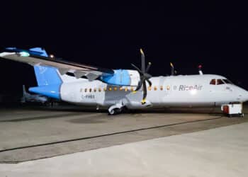 An ATR 42 in Rise Air colors