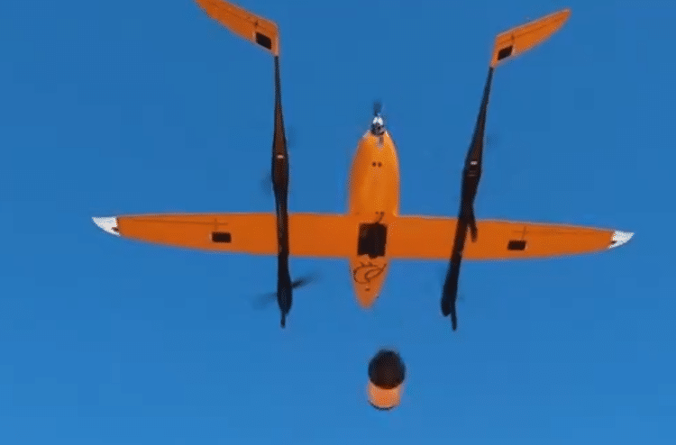 A RigiTech Eiger Drone deploys a package.