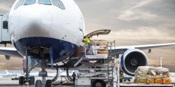 Cargo is loaded onto an airplane