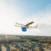 Wing drone carrying Walmart delivery