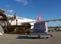 Cargo is loaded onto a Turkish Cargo freighter