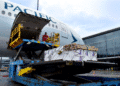 cargo being loaded onto a Cathay airplane