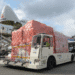 Air cargo on the tarmac in front of a Cargolux plane