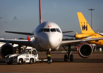 Menzies operates a pushback tug at LGW