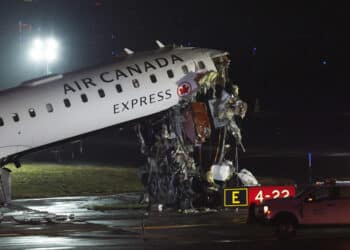 An Air Canada Express aircraft on the runway at LaGuardia Airport in New York on March 23. (Courtesy/Bloomberg)