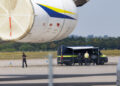 Police investigators work on the tarmac near to Ukrainian Antonov cargo plane at Leipzig/Halle Airport near Leipzig, Germany, on Aug. 5. (Courtesy/Bloomberg)