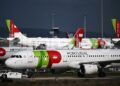 Passenger aircraft, operated by TAP SA, on the tarmac at Humberto Delgado airport in Lisbon.Photographer: Zed Jameson/Bloomberg