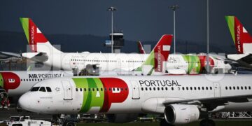 Passenger aircraft, operated by TAP SA, on the tarmac at Humberto Delgado airport in Lisbon.Photographer: Zed Jameson/Bloomberg